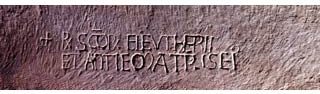 Epigraf ved graven til Eleuterius og Antia fra 1000-tallet i Basilica dei Ss Martiri Eleuterio ed Anzia